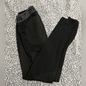 Black gym shark leggings, good for working out and very stretchy and smooth